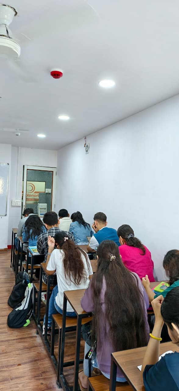 Vinay Academy classroom with students and teacher