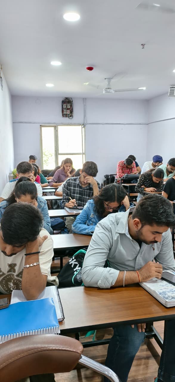 Vinay Academy classroom with students and teacher